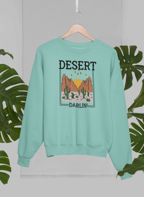 Desert Darlin Sweat Shirt featuring unique artistic designs, warm fleece lining, and adjustable cuffs for comfort.