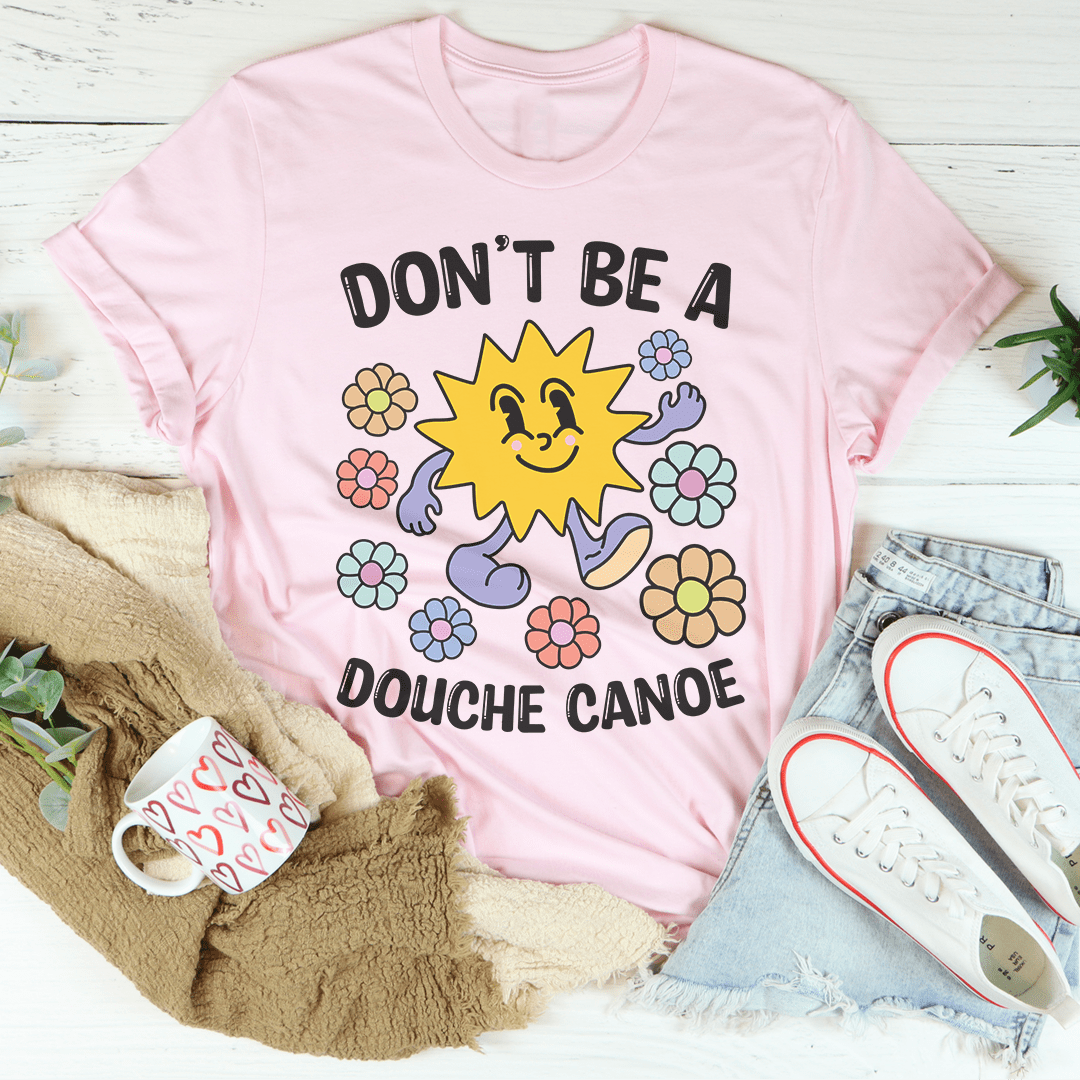 A comfortable Don't Be A Douche Canoe T-Shirt made from soft ring-spun cotton, featuring a humorous slogan in bold print.