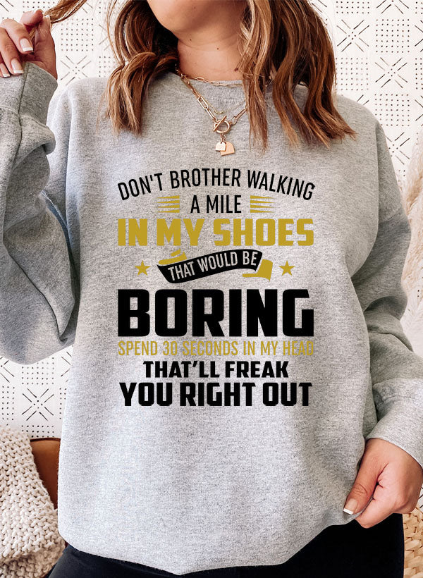 Cozy 'Don't Bother Walking a Mile in My Shoes' sweatshirt featuring a unique design by top artists, made from a warm cotton/poly fleece blend.