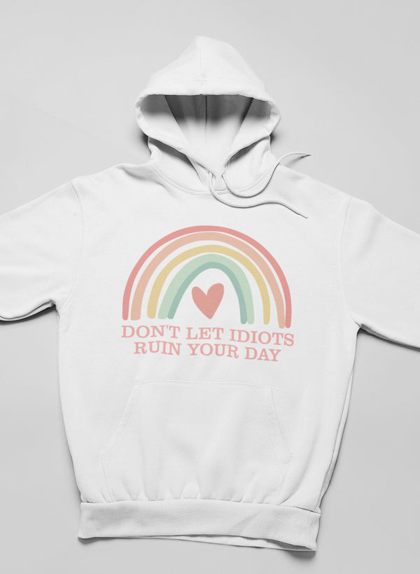 A stylish hoodie featuring the phrase 'Don't Let Idiots Ruin Your Day', designed by top artists, showcasing a cozy fleece material.