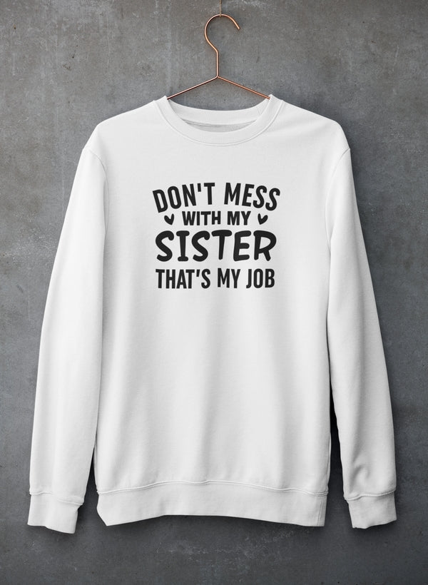 Cozy 'Don't Mess With My Sister That's My Job' Sweat Shirt in cotton/poly fleece blend, featuring adjustable banded cuffs and a playful design.