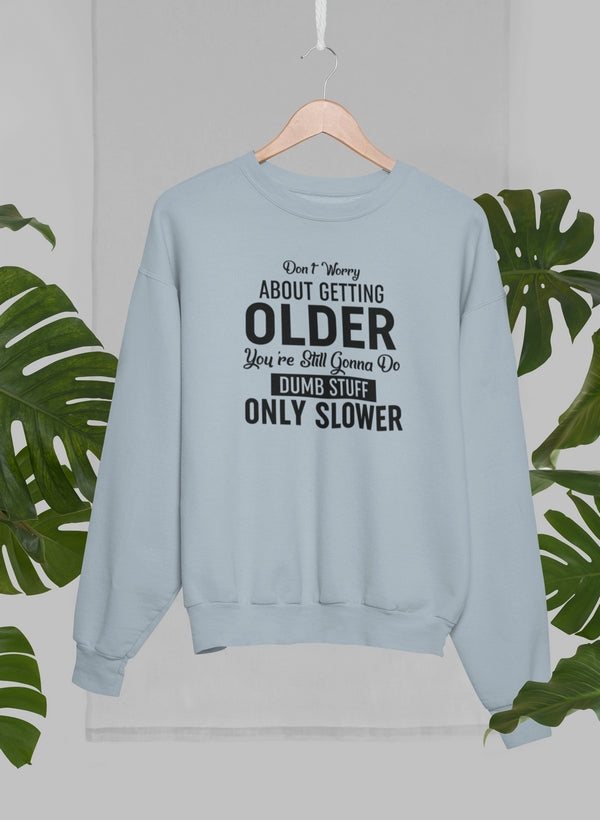 A cozy Don't Worry About Getting Older Sweat Shirt featuring a unique design by top artists, made from a soft cotton/poly fleece blend.