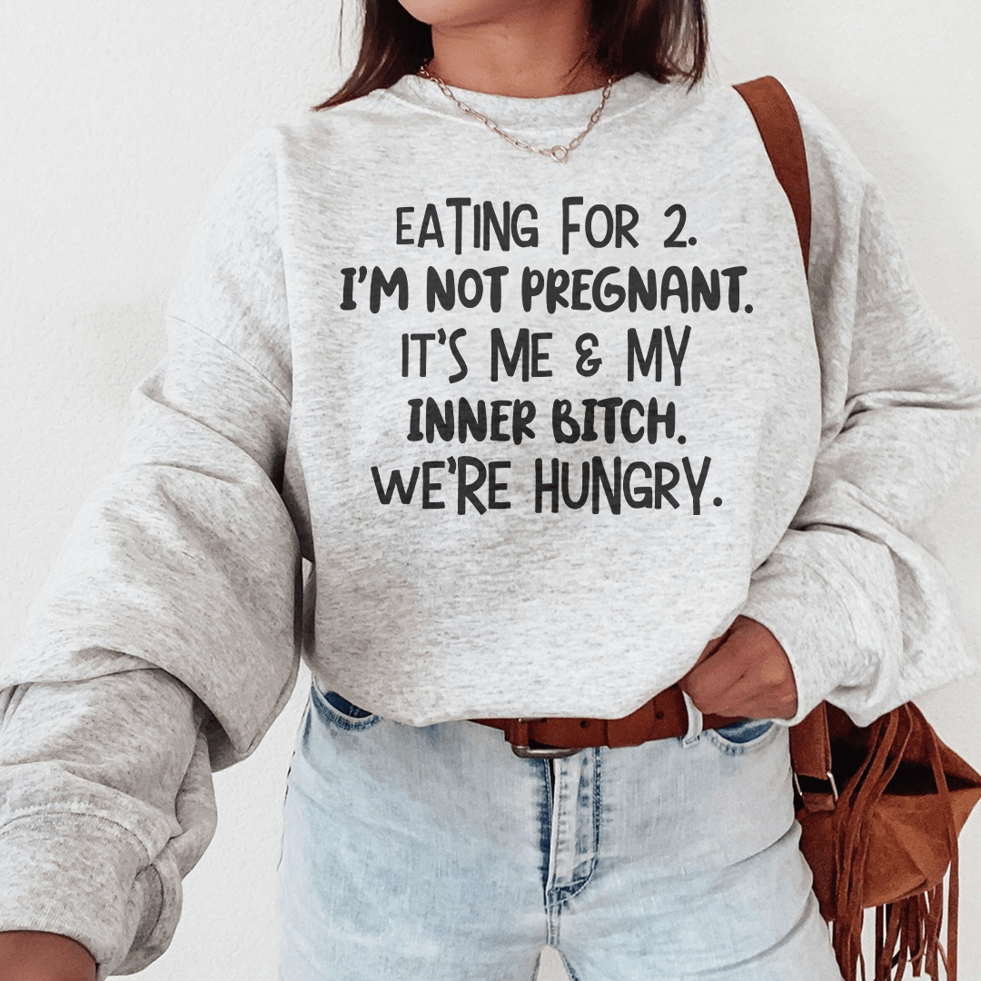 Cozy 'Eating For Two' sweats featuring a unique design by top artists, made from a soft cotton/poly fleece blend.