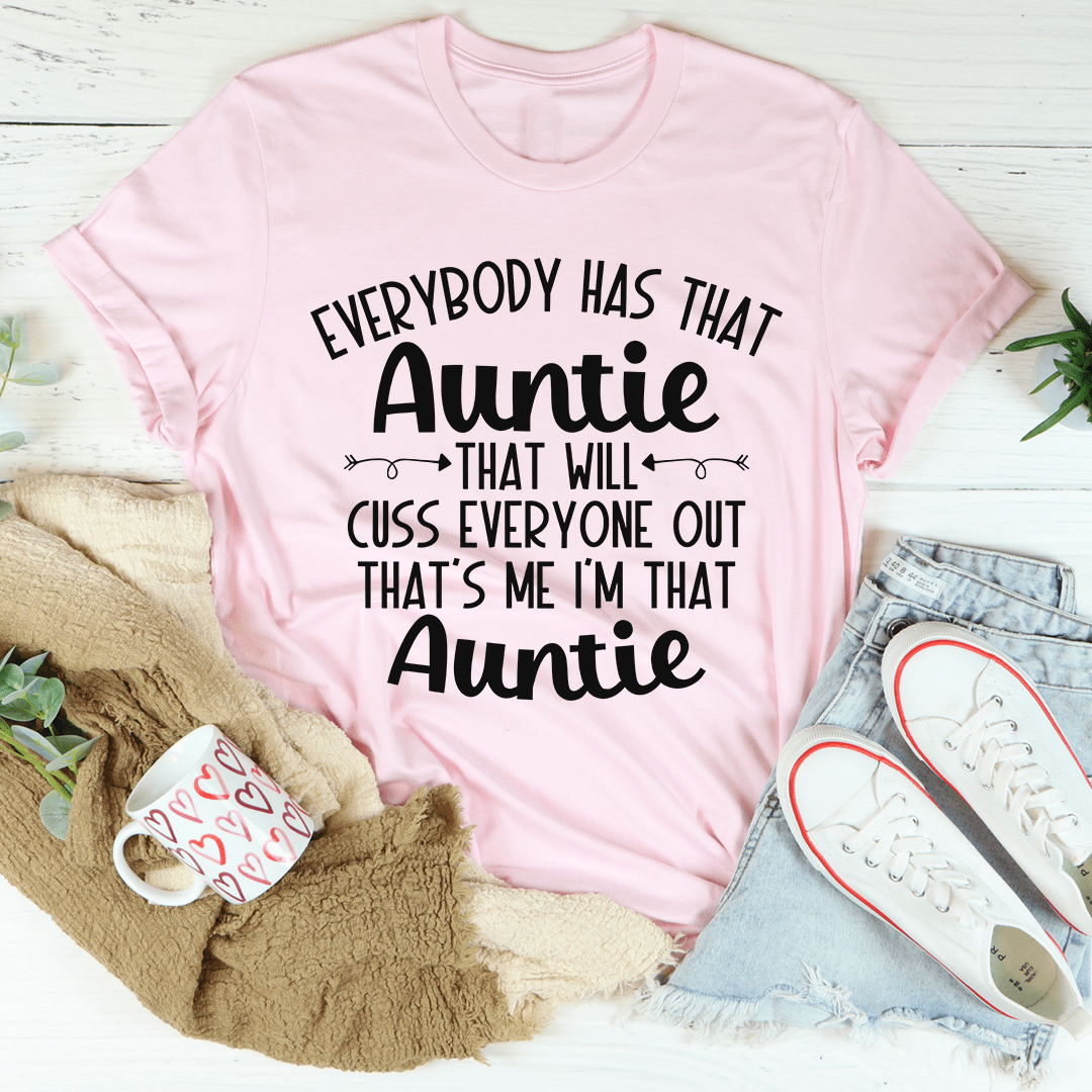 A humorous t-shirt featuring the phrase 'Everybody Has That Auntie That Will Cuss Everyone Out', made from soft cotton with double stitching.