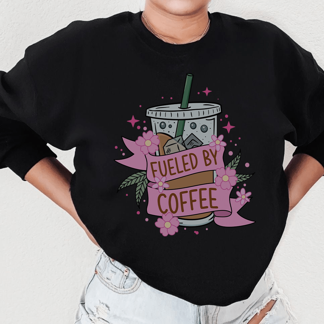 Cozy Fueled By Coffee sweats featuring unique designs by top artists, made from cotton/poly fleece blend.