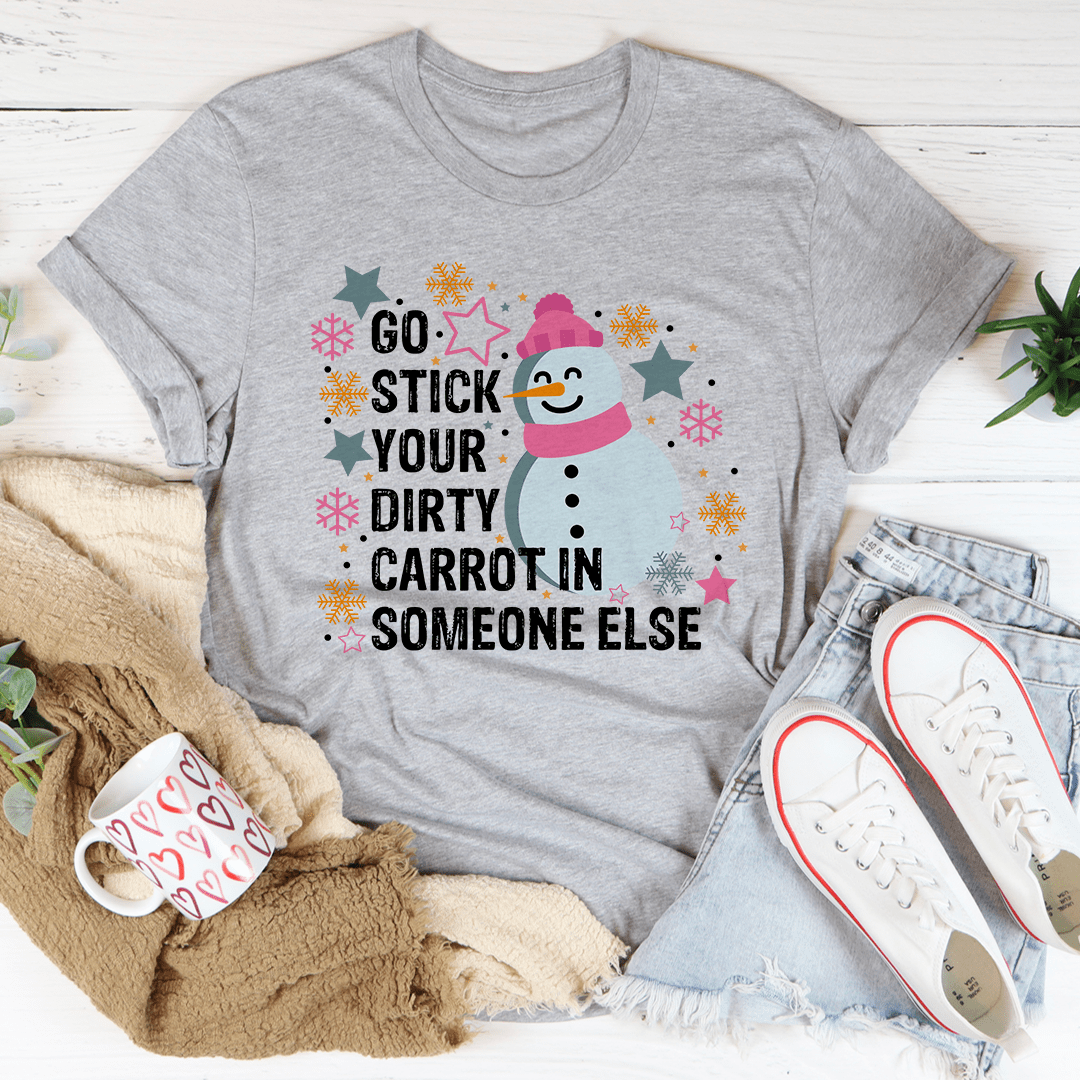 A humorous t-shirt featuring the phrase 'Go Stick Your Dirty Carrot In Someone Else', made from soft cotton with a durable design.