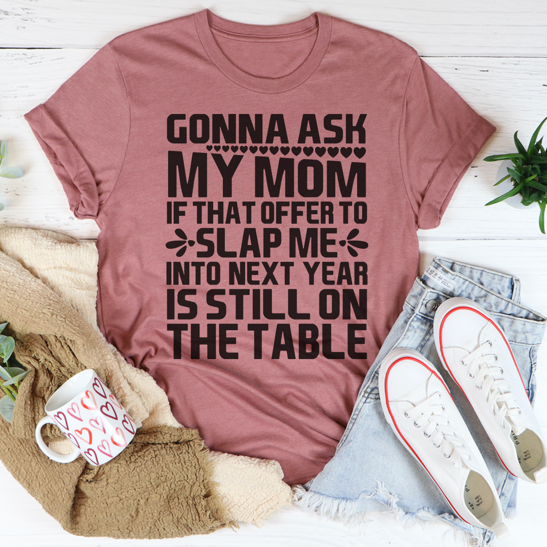 Gonna Ask My Mom Tee in various colors, showcasing its soft cotton fabric and double-stitched neckline.
