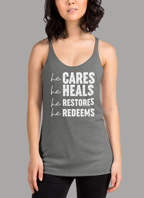 He Cares He Heals He Restores He Redeems Women's Tank Top in a stylish racer back design, showcasing its curved back hem and Neoteric™ fabric.