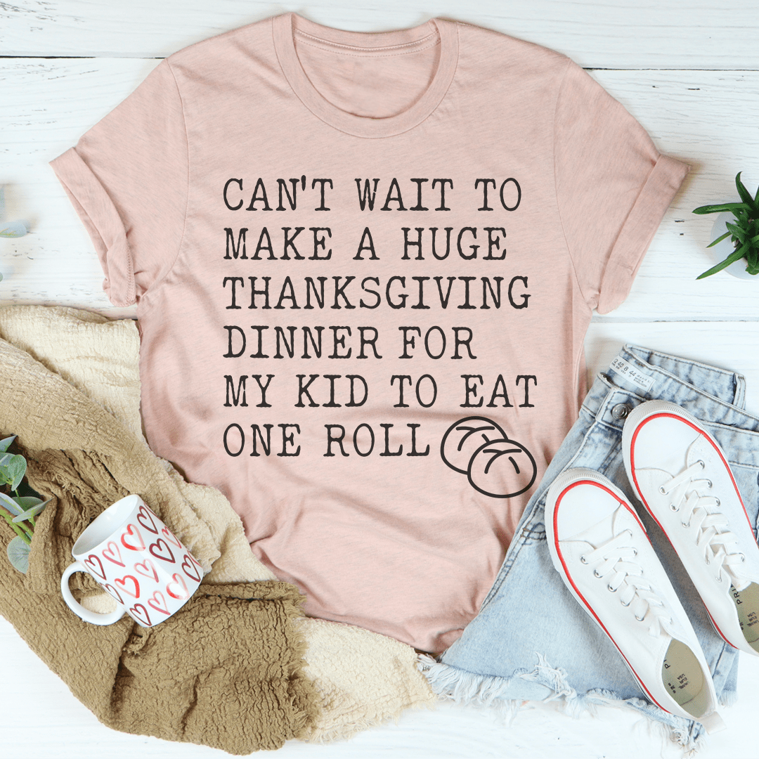 A cozy Huge Thanksgiving Dinner T-Shirt made of soft cotton, featuring a festive design perfect for Thanksgiving celebrations.