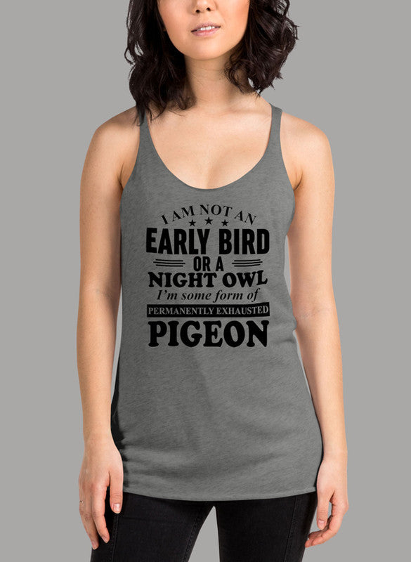 Black women's tank top featuring the phrase 'I Am Not An Early Bird Or A Night Owl' with a racerback design and curved back hem.