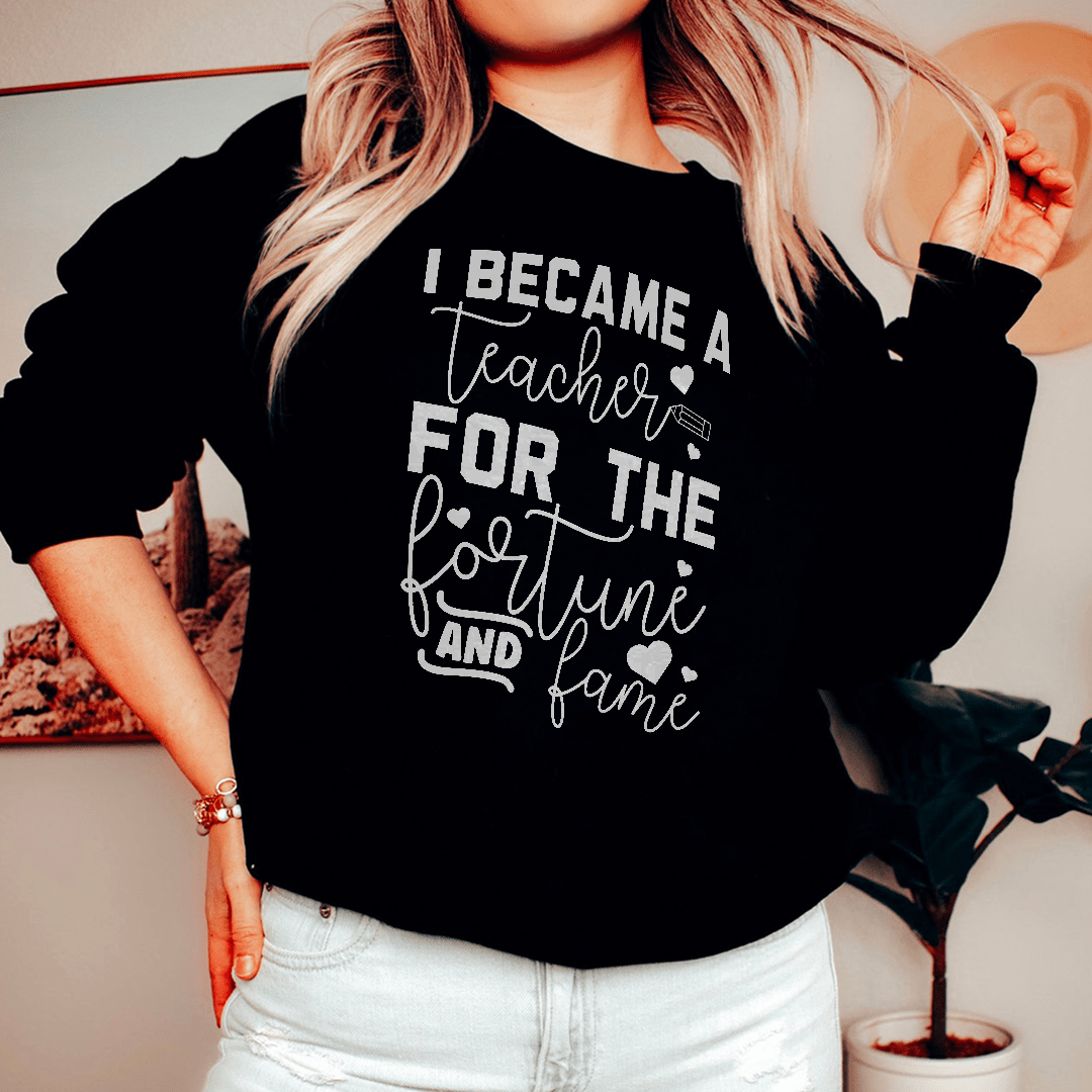Cozy 'I Became A Teacher For The Fortune And Fame' sweats featuring unique designs by top artists, made from a soft cotton/poly fleece blend.