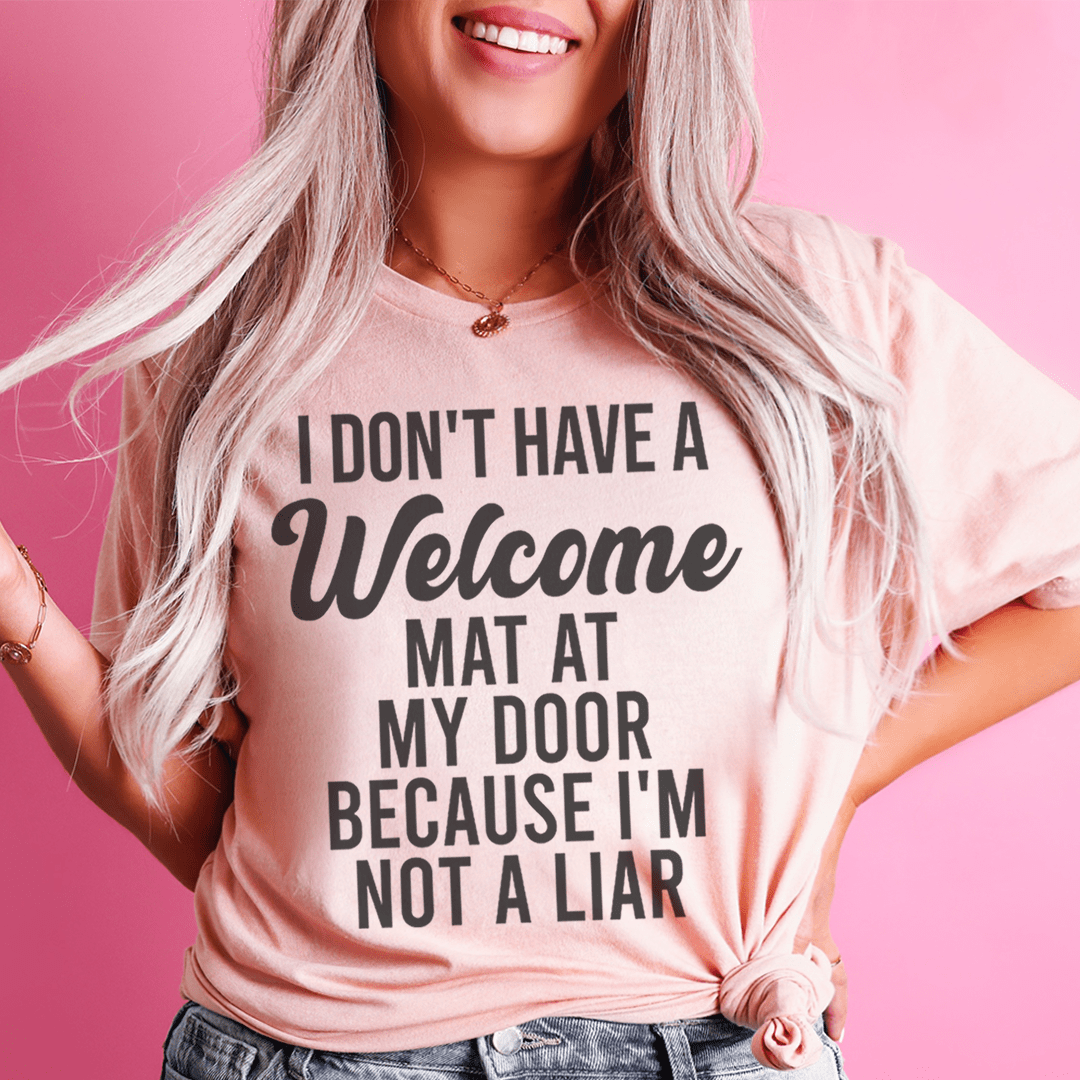 A stylish I Don't Have A Welcome Mat Tee made from soft ring-spun cotton, featuring double stitching for durability.