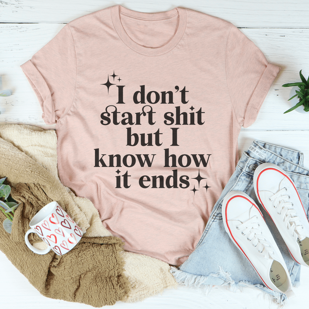 I Don't Start But I Know How It Ends Tee, a soft ring-spun cotton t-shirt with double stitching, available in various sizes.