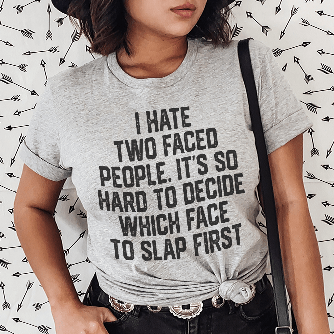 A stylish black t-shirt featuring the phrase 'I Hate Two Faced People' printed in bold letters, showcasing its soft fabric and durable stitching.