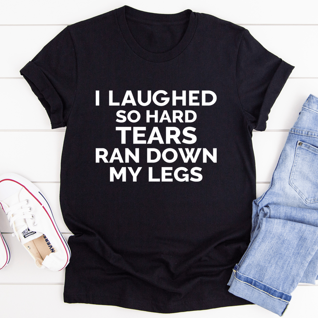 A humorous t-shirt featuring the phrase 'I Laughed So Hard Tears Ran Down My Legs', made from soft cotton with double stitching.