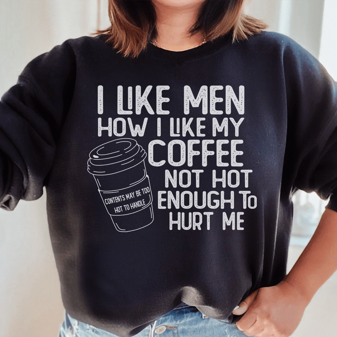 Cozy hoodie featuring the phrase 'I Like Men How I Like My Coffee Not Hot Enough To Hurt', made from soft cotton/poly fleece blend.