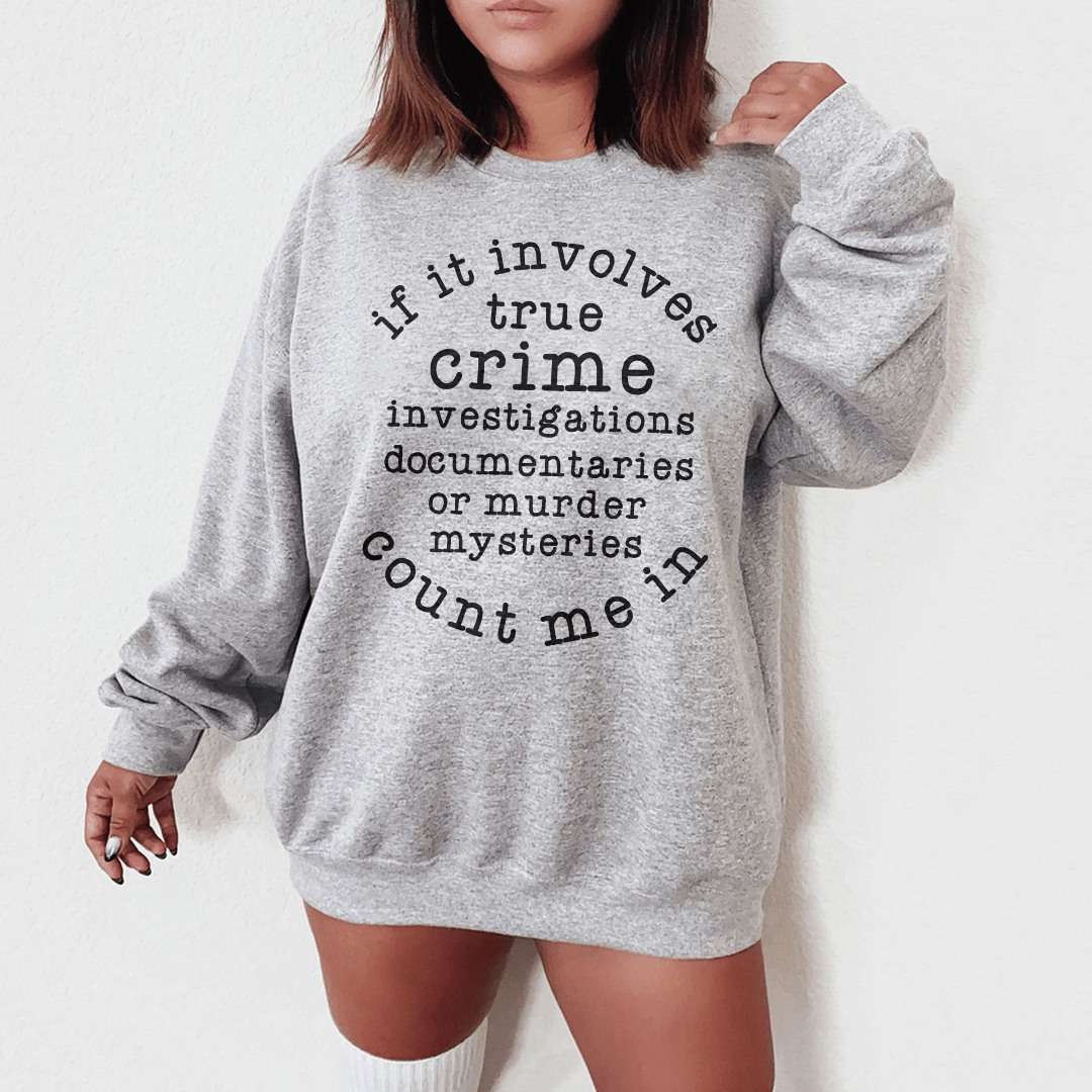 Cozy hoodie featuring a unique true crime design, made from soft cotton/poly fleece blend with adjustable cuffs.