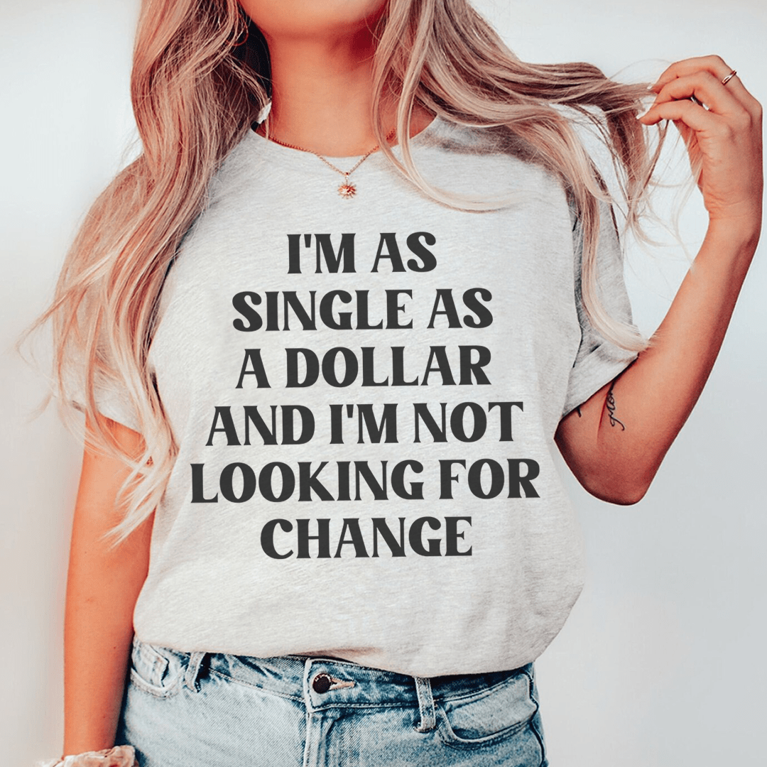I'm As Single As A Dollar Tee featuring a humorous print on a soft cotton fabric, showcasing its durability and comfort.