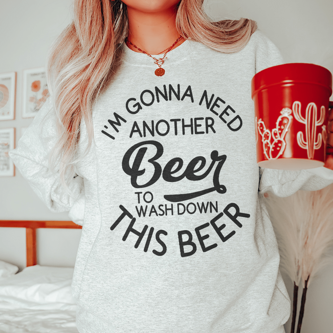 Cozy sweatshirt featuring the phrase 'I'm Gonna Need Another Beer' designed by top artists, made from cotton/poly fleece blend.