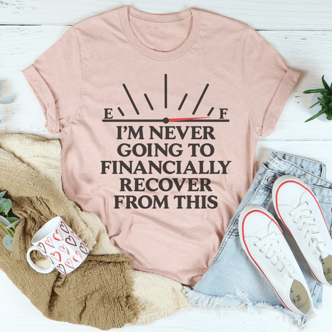 A humorous t-shirt featuring the phrase 'I'm Never Going To Financially Recover From This', made from soft ring-spun cotton with double stitching.