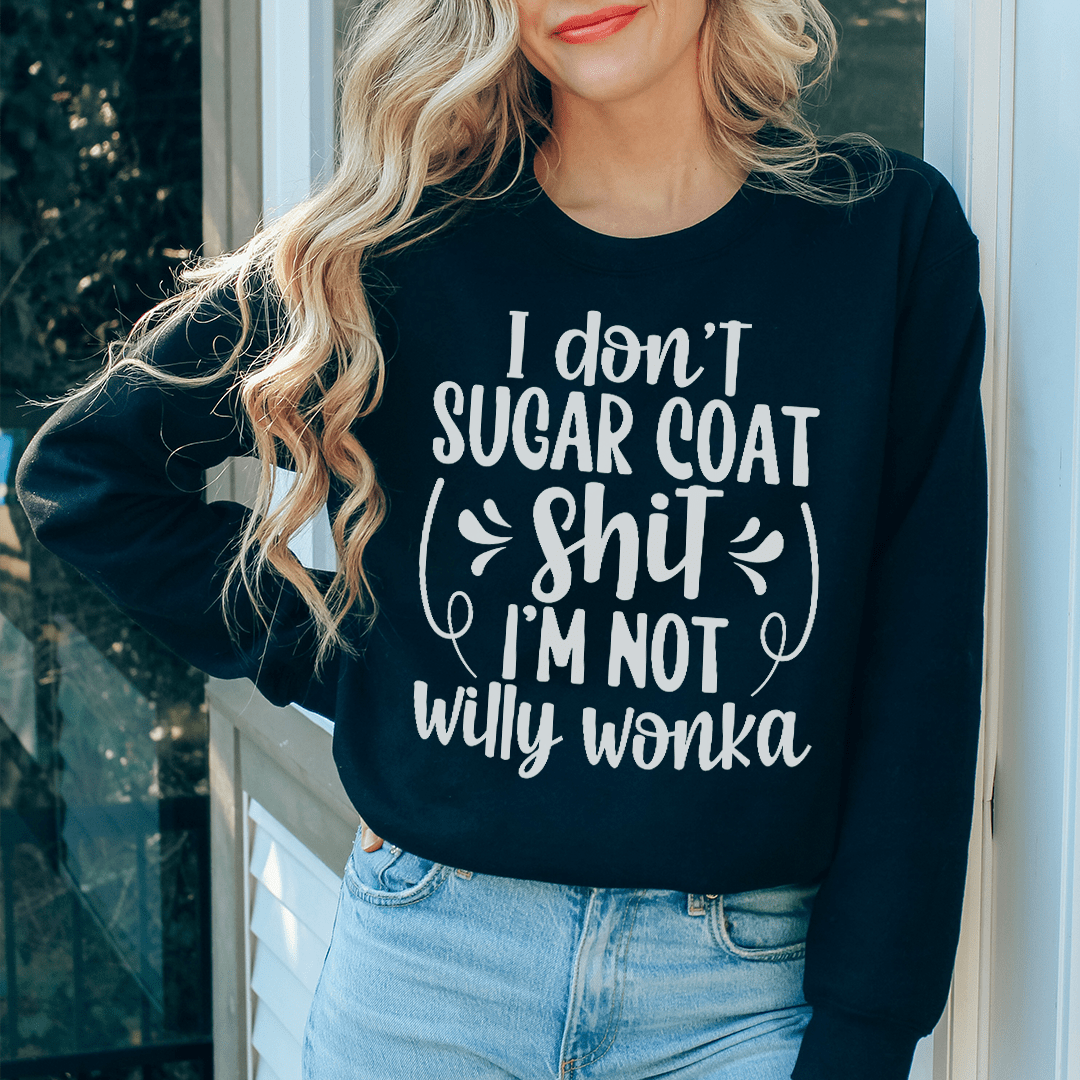 A cozy 'I'm Not Willy Wonka' sweatshirt featuring unique artistic designs, made from a warm cotton/poly fleece blend.