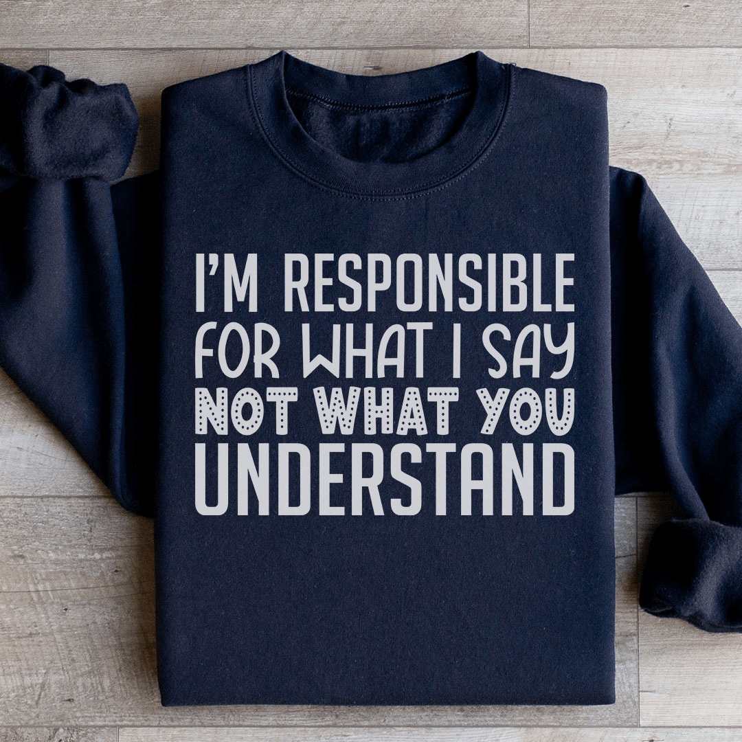 A stylish hoodie featuring the phrase 'I'm Responsible For What I Say Not What You Understand', designed by top artists, showcasing a cozy fleece material.