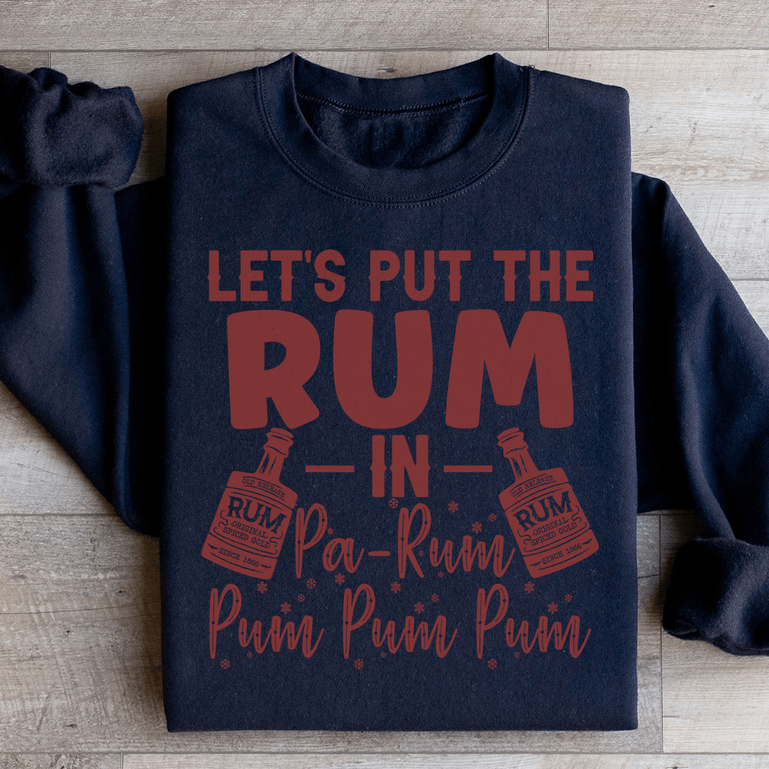 Cozy 'Let's Put the Rum in Pa Rum Pum Pum' sweats featuring a unique design by top artists, made from a warm cotton/poly fleece blend.