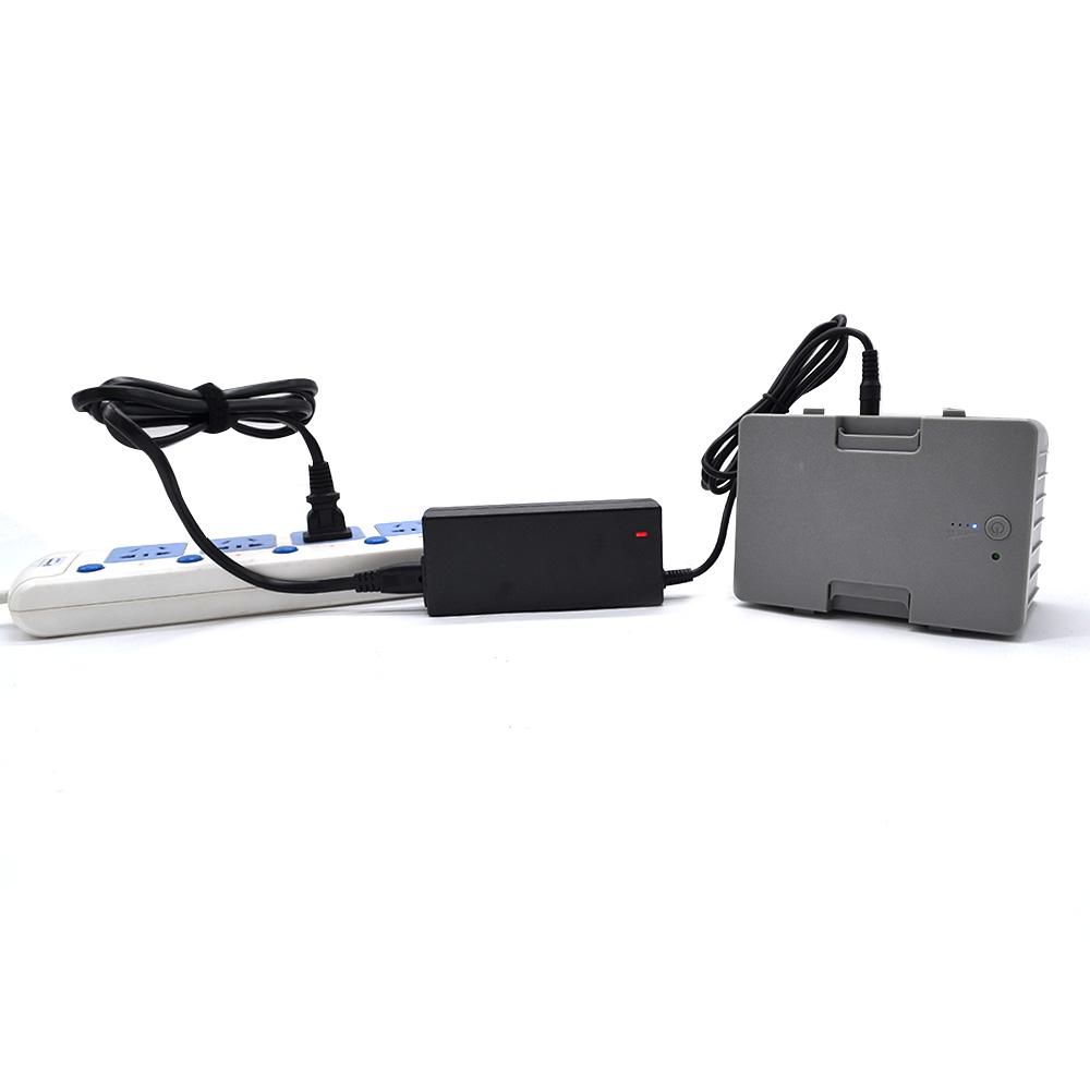 LionCooler 12.6V 3A Battery Charger with AC/DC power adapter, designed for solar freezer batteries.