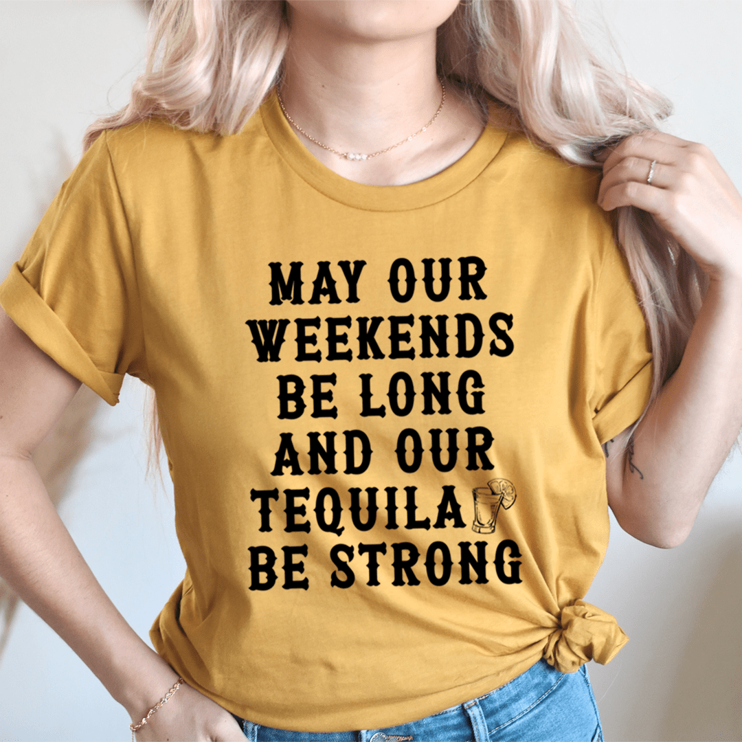 A stylish t-shirt featuring the slogan 'May Our Weekends Be Long And Our Tequila Be Strong', made from soft cotton with double stitching.