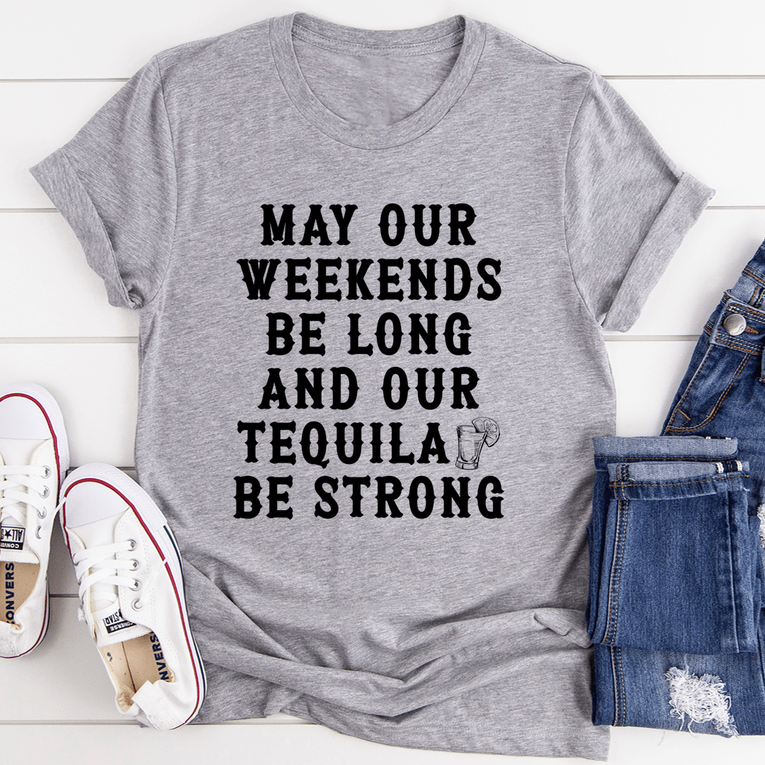 A stylish t-shirt featuring the slogan 'May Our Weekends Be Long And Our Tequila Be Strong', made from soft cotton with double stitching.