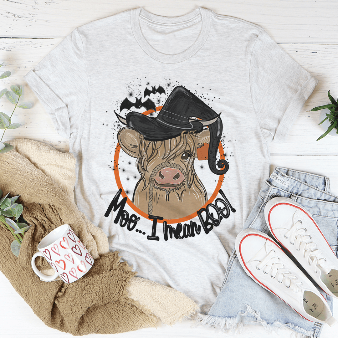 Moo I Mean Boo Cow Tee featuring a playful cow graphic on a soft cotton fabric.
