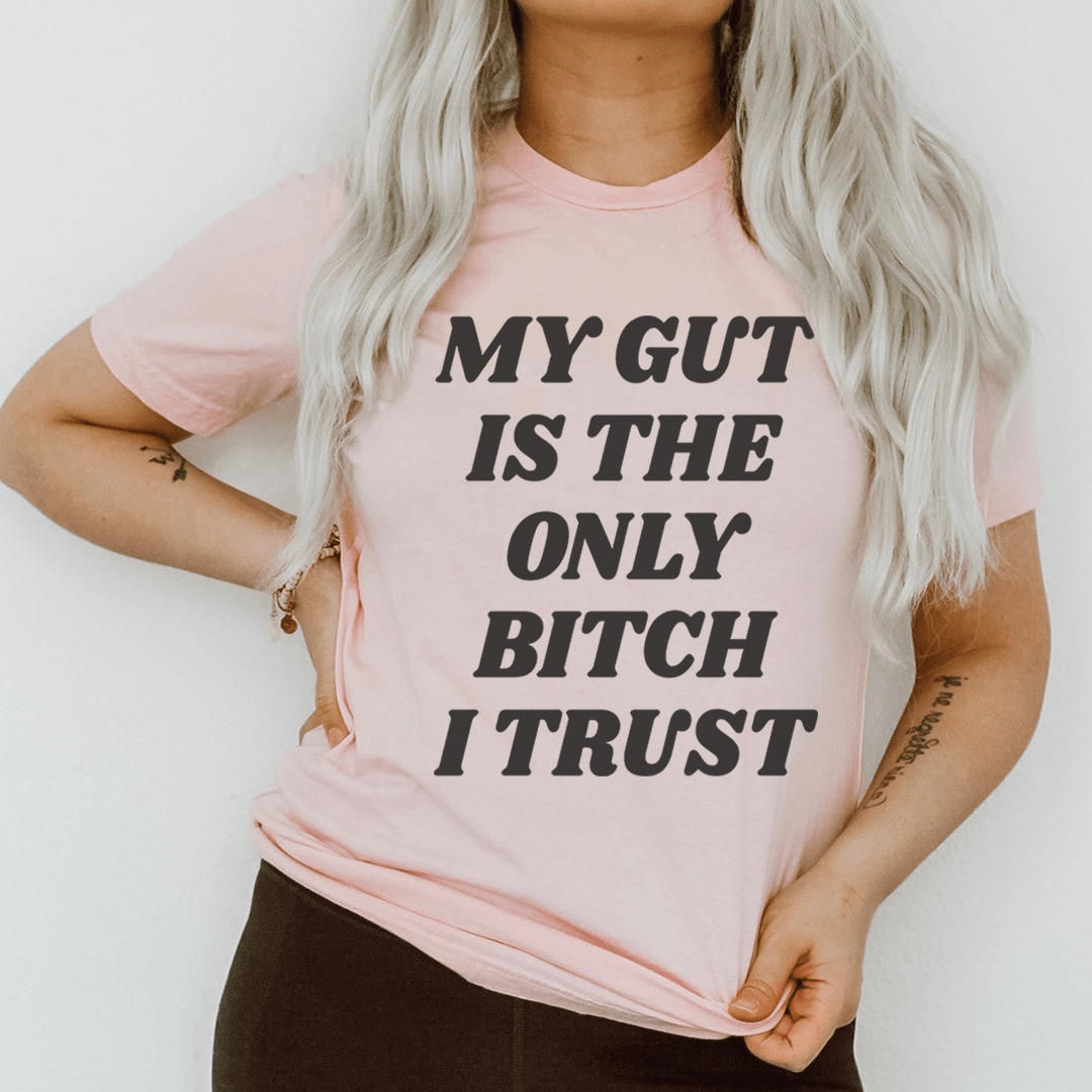 A stylish black t-shirt with the phrase 'My Gut Is The Only B I Trust' printed in bold letters, showcasing its soft fabric and durable stitching.