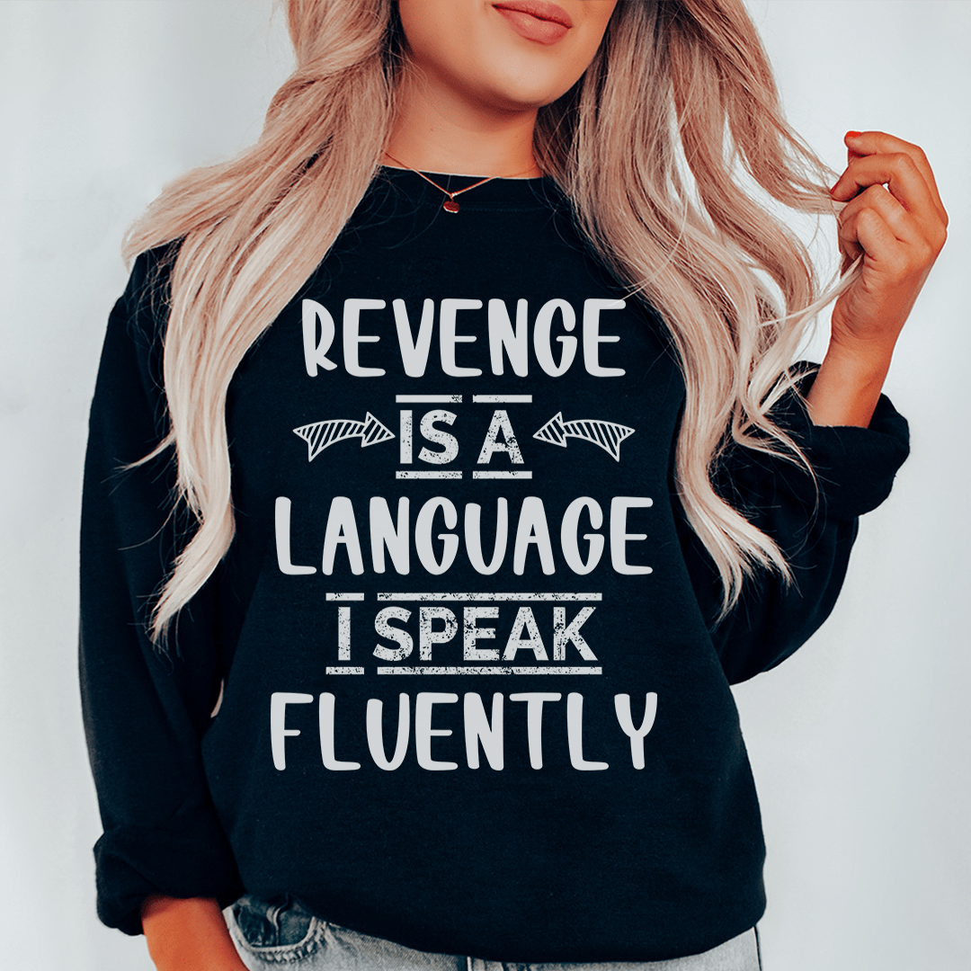 Cozy 'Revenge Is A Language I Speak Fluently' sweats featuring a unique design by top artists, made from cotton/poly fleece blend.