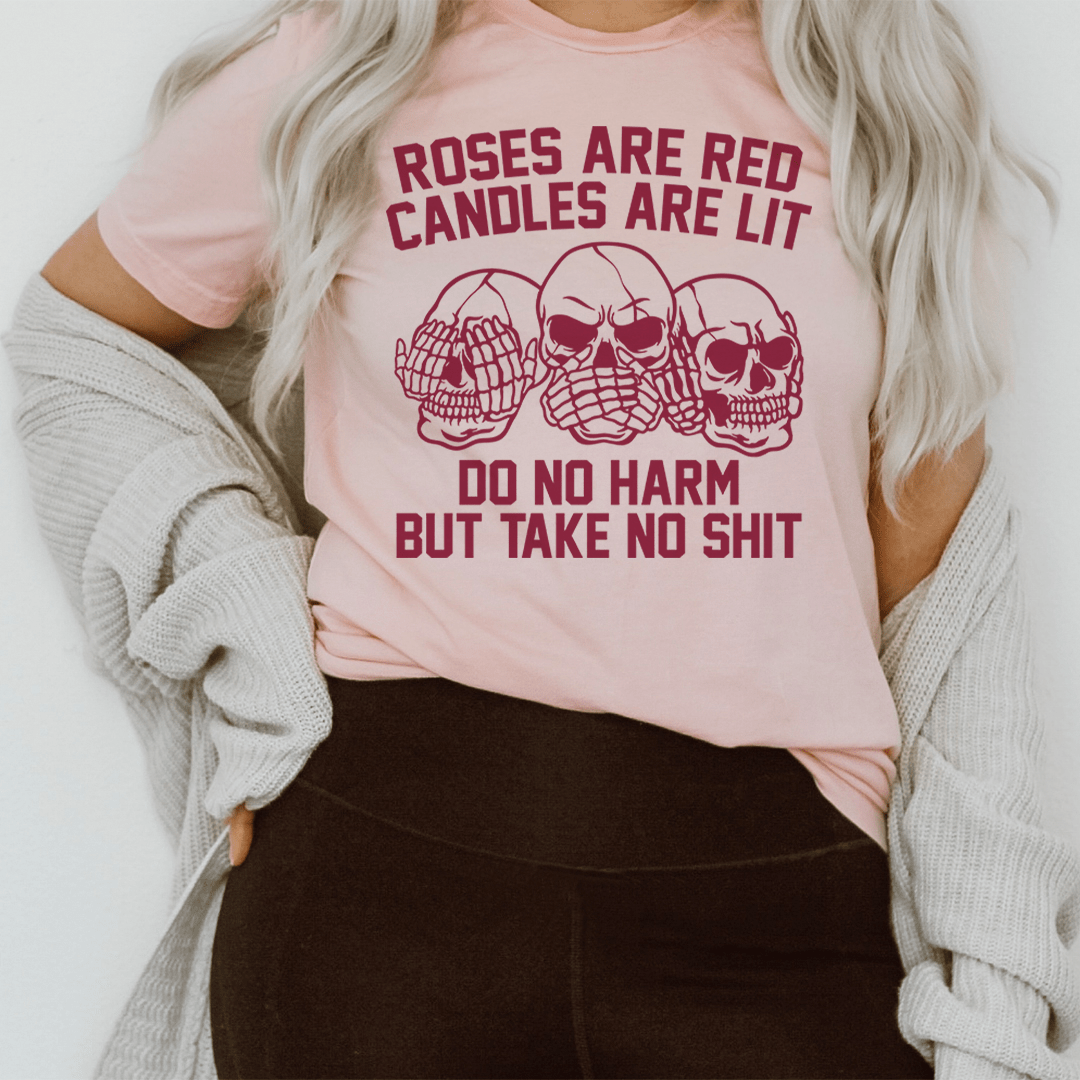 Roses Are Red Candles Are Lit Tee displayed on a hanger, showcasing its vibrant design and soft fabric.