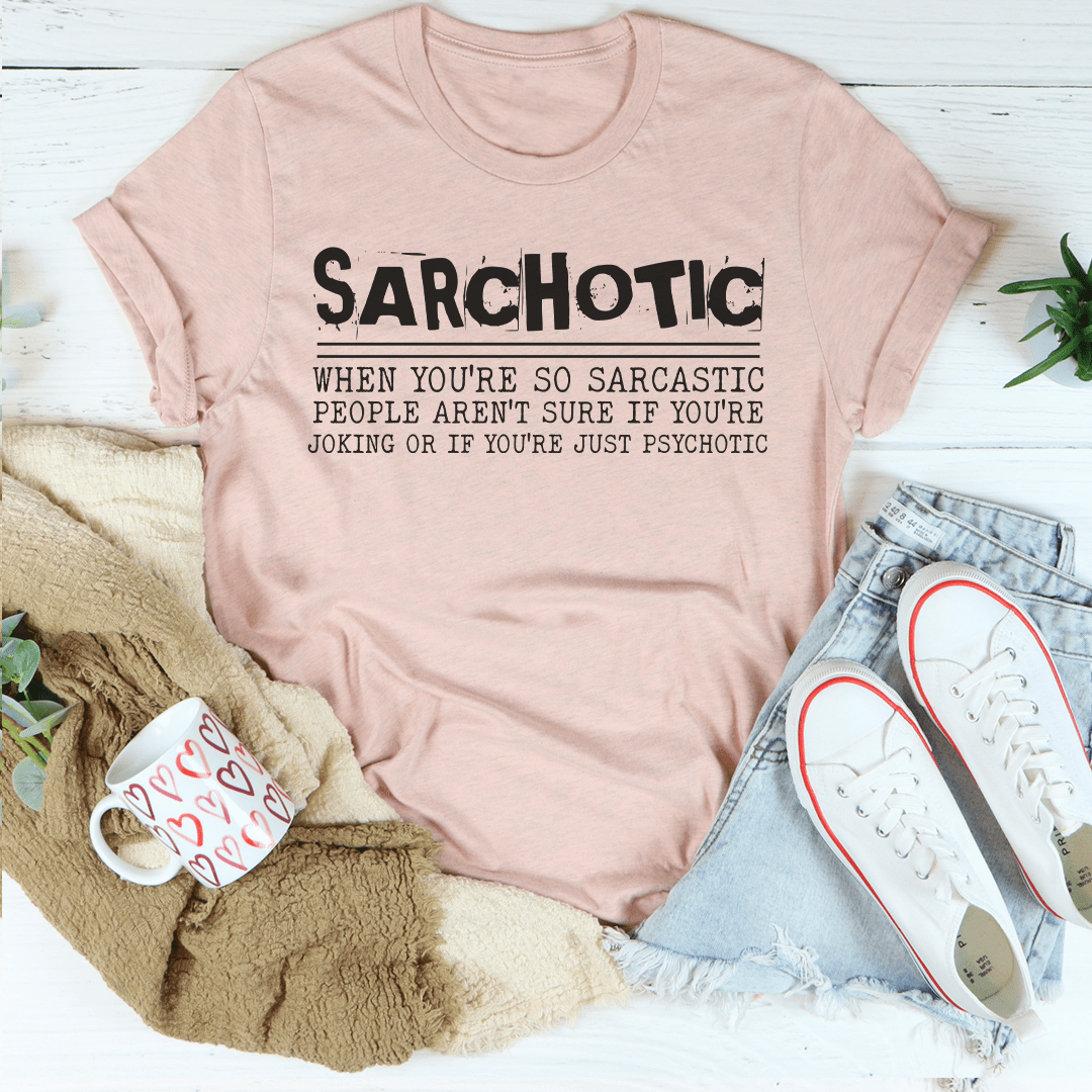 Sarchotic Tee in various colors, showcasing its soft cotton fabric and double stitching details.