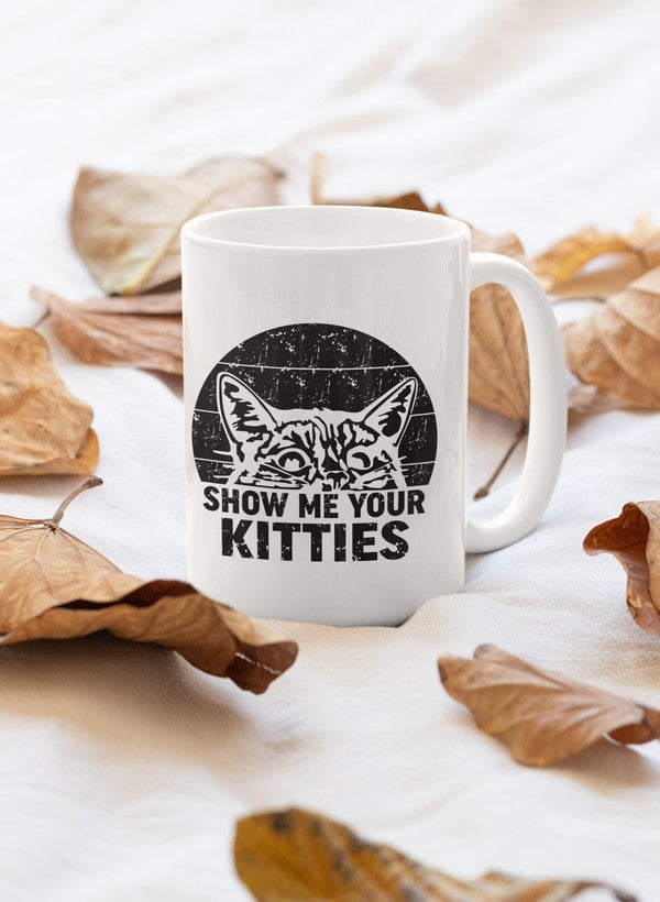 A stylish 11oz ceramic mug featuring a playful cat design, with a glossy finish and sturdy handle, perfect for cat lovers.