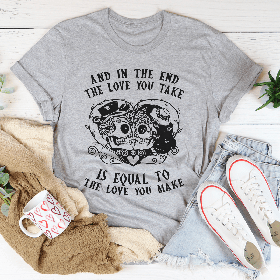 A stylish t-shirt featuring the phrase 'The Love You Take Is Equal To The Love You Make', made from soft ring-spun cotton.