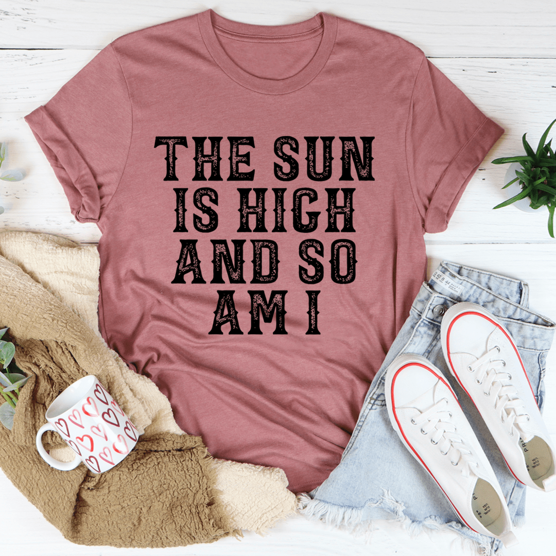 A stylish t-shirt featuring the phrase 'The Sun Is High And So Am I', made from soft ring-spun cotton with double stitching for durability.