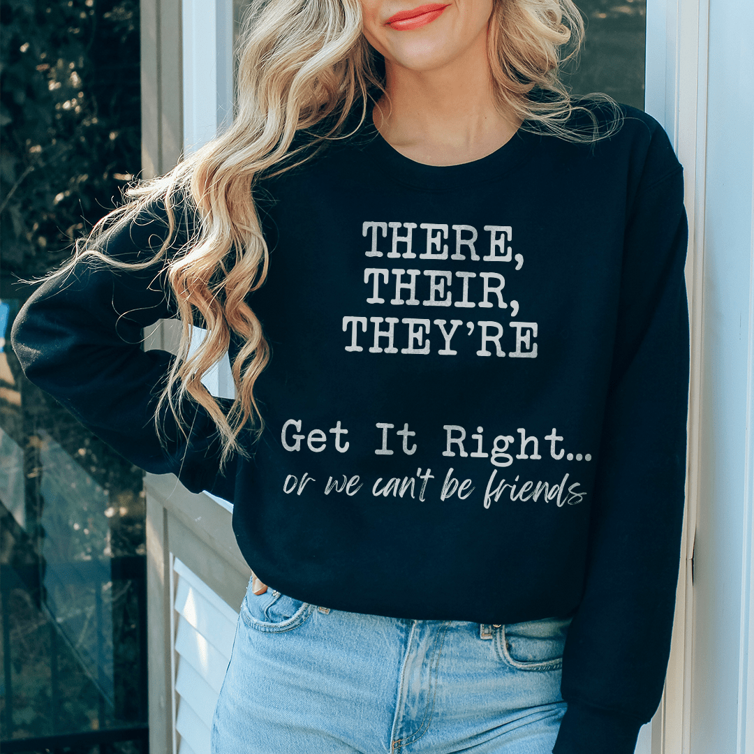 A stylish hoodie featuring the phrase 'There Their Theyre Get it Right Or We Cant Be Friends', made from a cozy cotton/poly fleece blend.