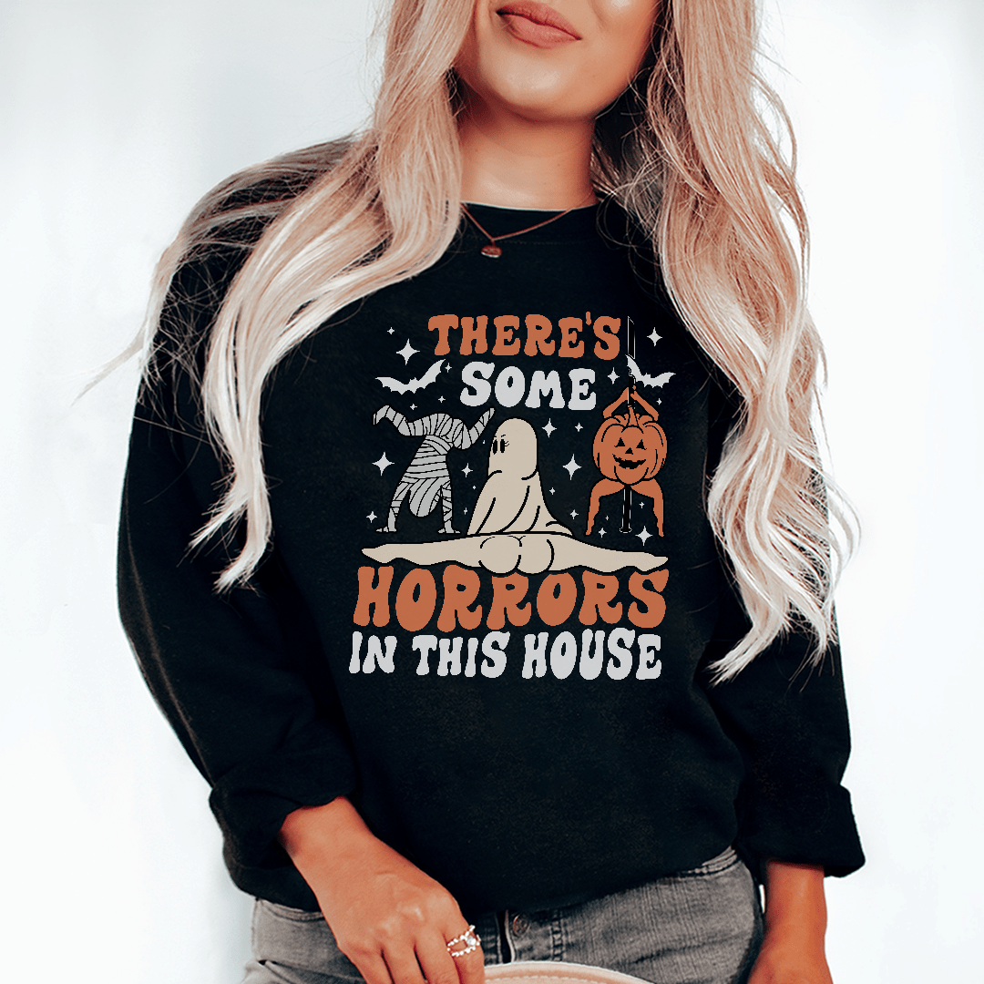 A cozy hoodie featuring a unique horror-themed design, made from soft cotton/poly fleece blend.