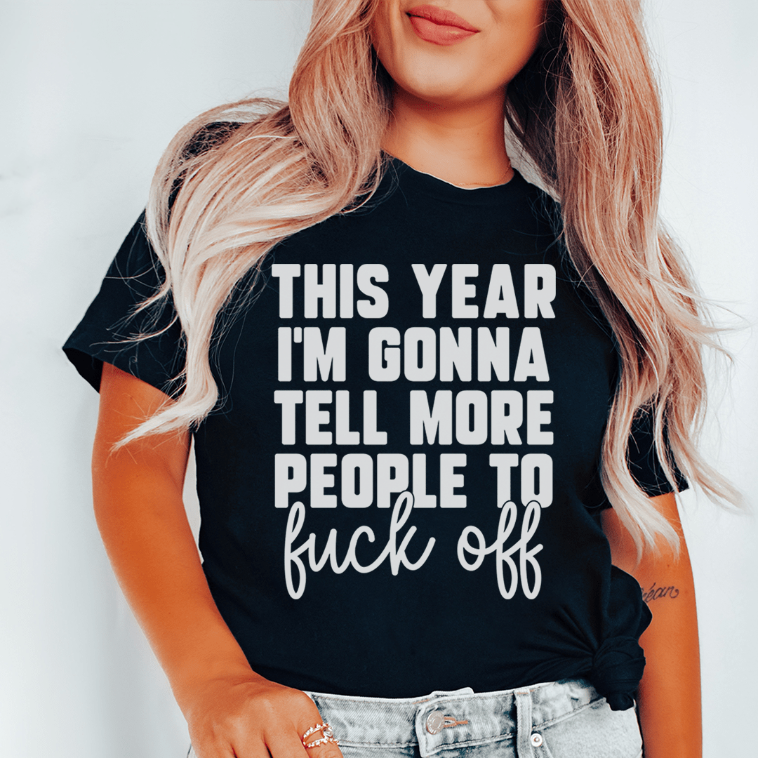 A comfortable and stylish t-shirt featuring the phrase 'This Year I'm Gonna Tell More People', made from soft ring-spun cotton with double stitching.