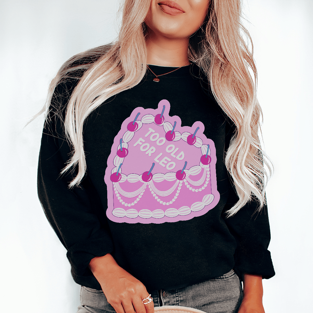 A cozy pair of 'Too Old For Leo' sweats featuring unique artistic designs, made from a soft cotton/poly fleece blend.