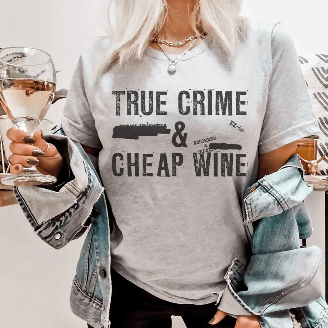 A stylish True Crime & Cheap Wine Tee made from soft cotton, featuring a unique print and durable double stitching.