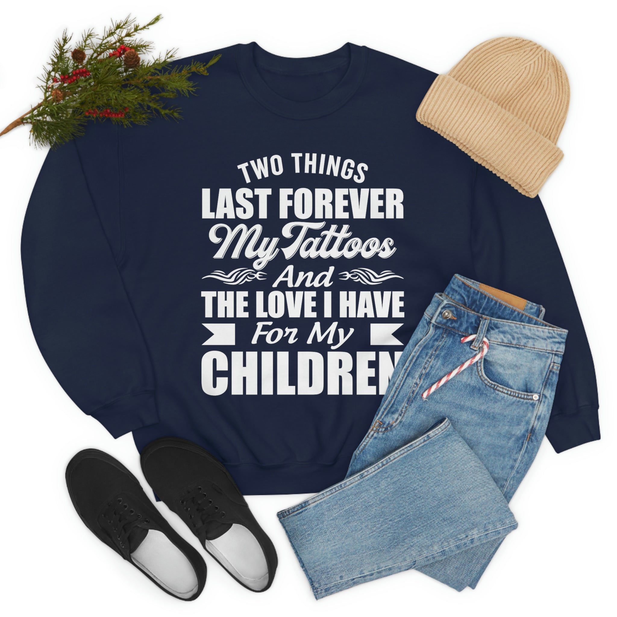 A stylish t-shirt featuring the phrase 'Two Things Last Forever My Tattoos And The Love I Have For My Children' printed on soft cotton fabric.