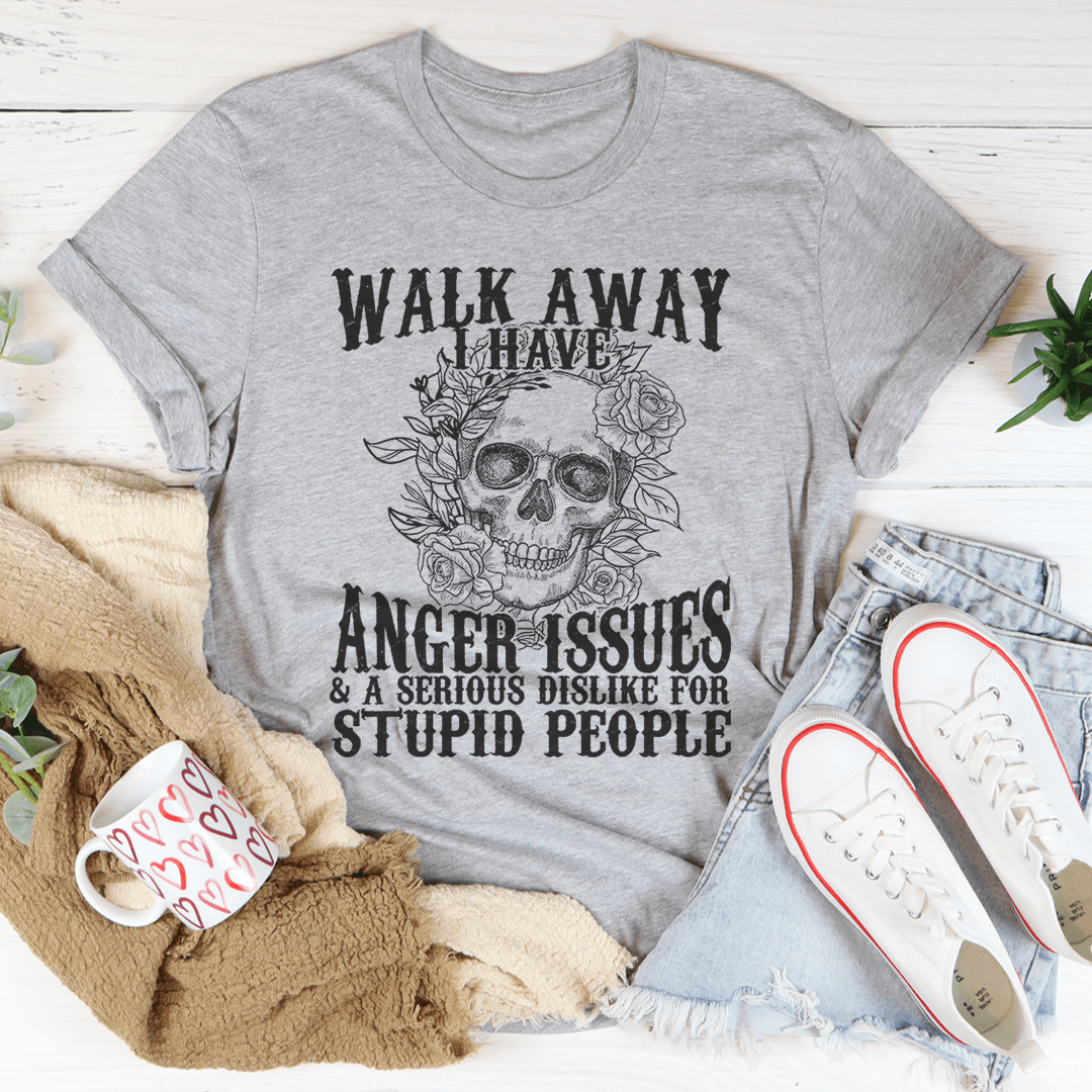 A comfortable Walk Away I Have Anger Issues T-Shirt made from soft ring-spun cotton, featuring a humorous text design.