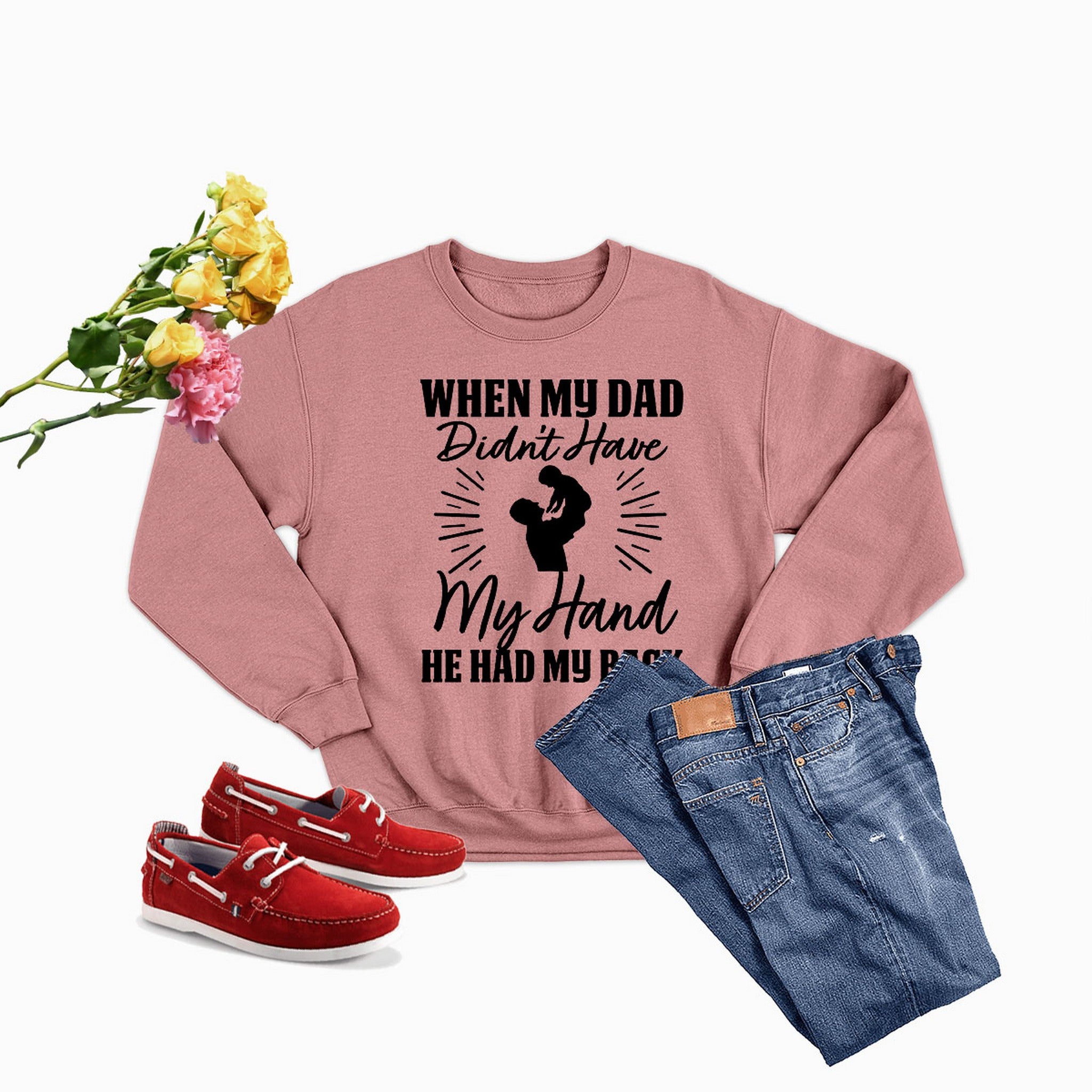 A cozy sweatshirt featuring unique artistic designs, made from a cotton/poly fleece blend, showcasing adjustable banded cuffs.