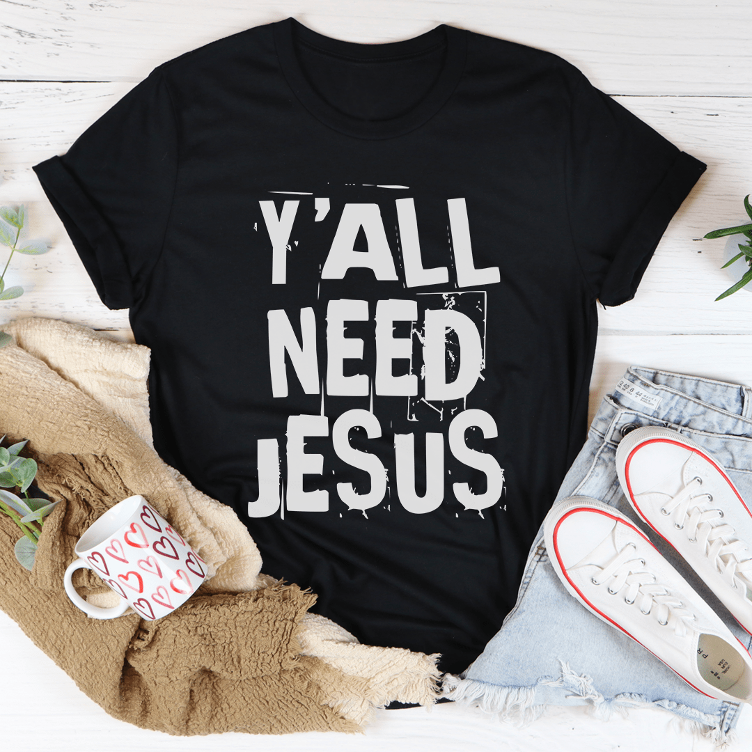 Y'All Need Jesus Tee in various colors, showcasing its soft cotton fabric and durable stitching.