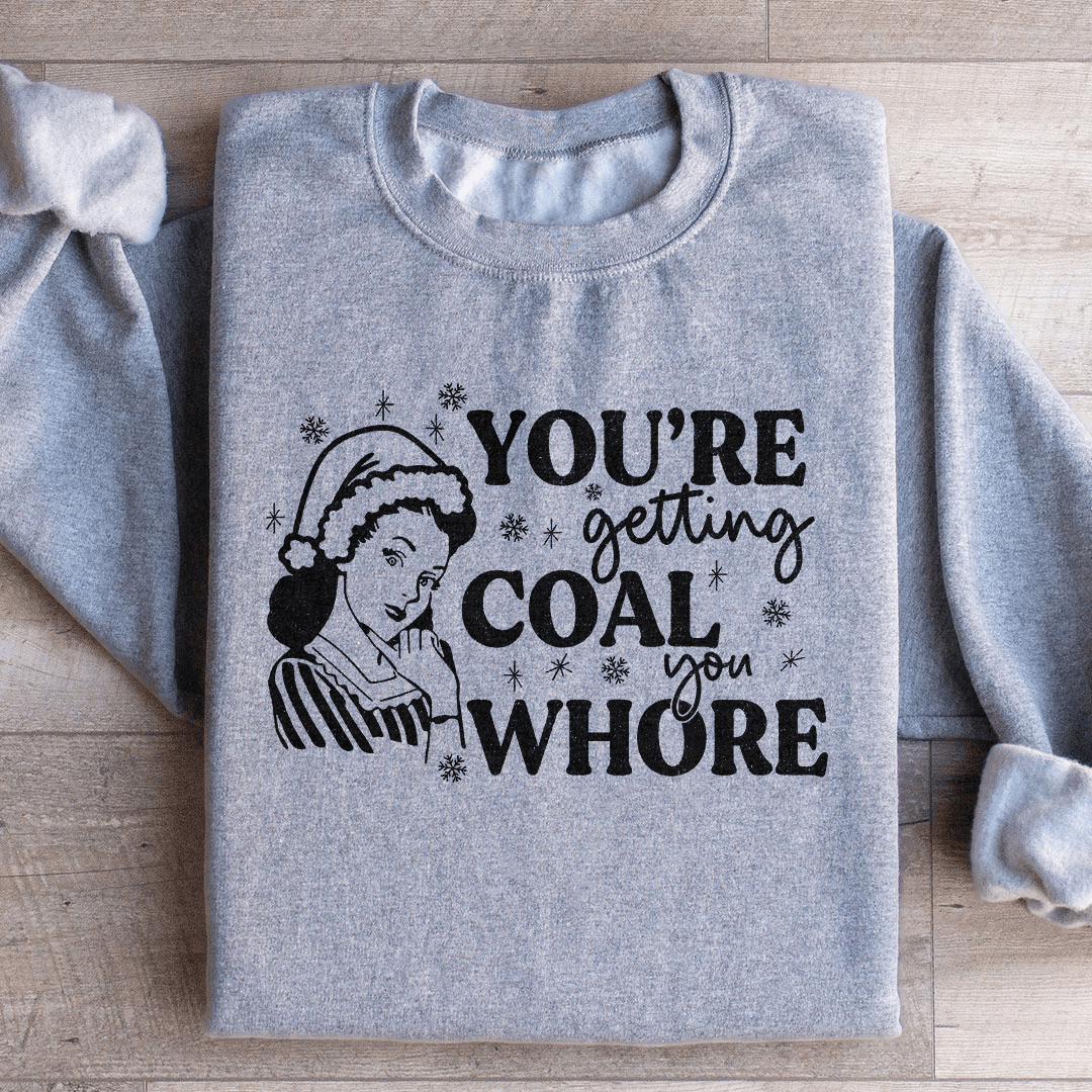 Cozy 'You're Getting Coal' sweats featuring a warm fleece lining and adjustable cuffs, designed by top artists.