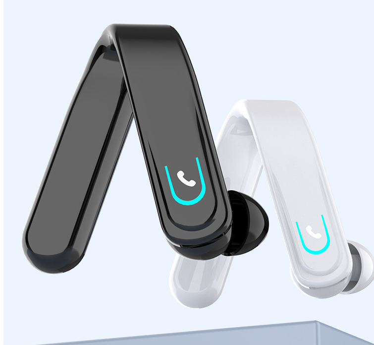 Bluetooth Earphone Mounting Ear with charging cable and manual, showcasing its sleek design and compact size.