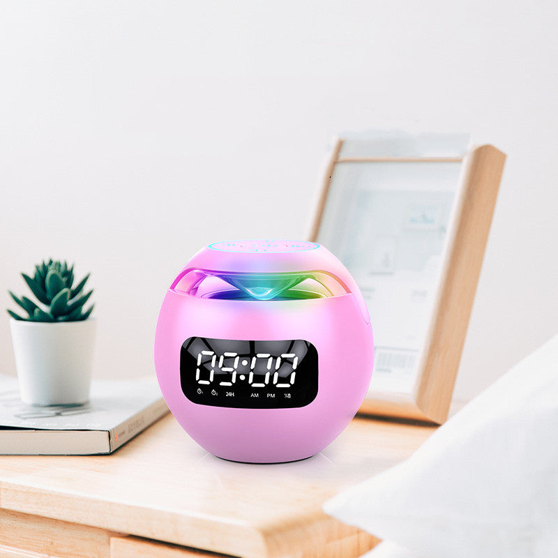 Dazzle Colour Mini Ball Card Bluetooth Speakers with colorful lights and clock display, showcasing a compact design.